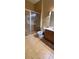 Bathroom with shower, toilet and wood vanity at 898 Oak St # 1127, Atlanta, GA 30310