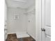 Convenient laundry room with shelving and a built-in utility sink at 5011 Renvyle Dr. (Lot 11) Se Dr, Atlanta, GA 30339