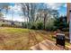 Spacious backyard with deck and grill, offering a great space for outdoor entertaining at 1587 Alder Se Ct, Atlanta, GA 30317