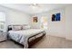 King bedroom with ceiling fan and modern art at 1587 Alder Se Ct, Atlanta, GA 30317