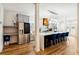 Modern kitchen with island, stainless steel appliances, and hardwood floors at 1587 Alder Se Ct, Atlanta, GA 30317