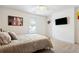 Spacious bedroom with neutral decor and a ceiling fan at 1587 Alder Se Ct, Atlanta, GA 30317