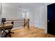 Upstairs office space with built-in desk and wood flooring at 1587 Alder Se Ct, Atlanta, GA 30317