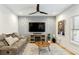 Living room with large TV and geometric wall at 1587 Alder Se Ct, Atlanta, GA 30317