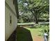 Side yard with a view of a neighboring house at 1799 Brandy Woods Se Trl, Conyers, GA 30013