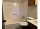 Bathroom with tub, shower, toilet, and vanity at 1799 Brandy Woods Se Trl, Conyers, GA 30013