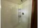 Clean shower with built-in shelves and caddy at 1799 Brandy Woods Se Trl, Conyers, GA 30013