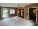 Spacious living room with access to backyard and other rooms at 1799 Brandy Woods Se Trl, Conyers, GA 30013