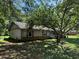 Single story home with red brick accents and a well-maintained lawn at 1799 Brandy Woods Se Trl, Conyers, GA 30013