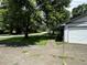 View of the home's driveway and side yard at 1799 Brandy Woods Se Trl, Conyers, GA 30013