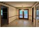 Bright dining area with wood flooring and access to a patio at 1799 Brandy Woods Se Trl, Conyers, GA 30013