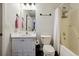 Clean bathroom with white vanity, tub, and shower at 376 Cattlemans Cir, Mcdonough, GA 30252