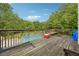 Spacious deck overlooking a refreshing above ground pool at 376 Cattlemans Cir, Mcdonough, GA 30252