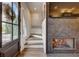 Modern staircase with wood flooring and a view to the entryway at 330 Heatherden Ave, Fayetteville, GA 30214