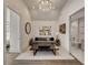 Spacious sitting room with dark wood coffee table and comfortable gray couch at 330 Heatherden Ave, Fayetteville, GA 30214