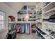 Large walk-in closet with ample shelving and hanging space at 330 Heatherden Ave, Fayetteville, GA 30214