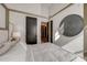 Bedroom with a canopy bed, large artwork and hardwood floors at 330 Heatherden Ave, Fayetteville, GA 30214