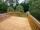 Wooden deck overlooking backyard at 3393 Madison Farm Way, Snellville, GA 30039