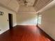 Bright bedroom featuring hardwood floors and a ceiling fan at 3393 Madison Farm Way, Snellville, GA 30039