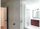 Double vanity bathroom with marble tile floors at 4205 Old House Dr, Conley, GA 30288