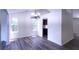 Dining room with hardwood floors, chandelier and kitchen view at 4205 Old House Dr, Conley, GA 30288