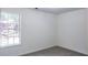Bright bedroom with a window and neutral decor at 4205 Old House Dr, Conley, GA 30288