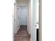 Bright hallway with wood-look flooring at 4205 Old House Dr, Conley, GA 30288