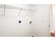 Laundry area with utility hookups and metal shelving at 4205 Old House Dr, Conley, GA 30288