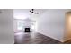 Bright living room with hardwood floors and a fireplace at 4205 Old House Dr, Conley, GA 30288