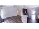 Open concept kitchen with island and stainless steel appliances at 4205 Old House Dr, Conley, GA 30288