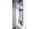 Unfinished mechanical room with water heater and pipes at 4205 Old House Dr, Conley, GA 30288
