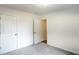 Spacious bedroom with double closets and neutral decor at 4205 Old House Dr, Conley, GA 30288