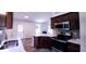 Open concept kitchen with stainless steel appliances at 4205 Old House Dr, Conley, GA 30288