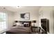 Cozy bedroom with large window, TV, and stylish decor at 4205 Old House Dr, Conley, GA 30288