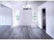 Bright dining room with hardwood floors and chandelier at 4205 Old House Dr, Conley, GA 30288