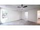 Large bedroom with walk-in closet and ceiling fan at 4205 Old House Dr, Conley, GA 30288