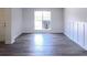 Bright dining room features hardwood floors and wainscoting at 4205 Old House Dr, Conley, GA 30288