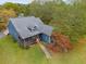 Aerial view showing house and surrounding landscape at 210 Pine Valley Rd, Hiram, GA 30141