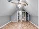 Spacious bedroom with wood flooring and ceiling fan at 210 Pine Valley Rd, Hiram, GA 30141
