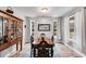 Formal dining room with hardwood floors and large windows at 210 Pine Valley Rd, Hiram, GA 30141