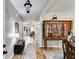 Bright entryway with hardwood floors and wooden cabinet at 210 Pine Valley Rd, Hiram, GA 30141