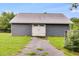 Detached garage with white door and metal roof at 210 Pine Valley Rd, Hiram, GA 30141