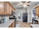 Kitchen with wood cabinets, granite counters, and stainless steel appliances at 210 Pine Valley Rd, Hiram, GA 30141