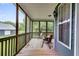 Relaxing screened porch with wooden deck and seating at 210 Pine Valley Rd, Hiram, GA 30141