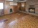 Spacious basement with brick fireplace and wood paneled walls at 8347 Hilltop Rd, Jonesboro, GA 30236
