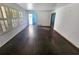 Bright living room with hardwood floors and ample natural light at 8347 Hilltop Rd, Jonesboro, GA 30236