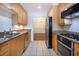 Eat-in kitchen with granite countertops and stainless steel appliances at 1735 Peachtree Ne St # 321, Atlanta, GA 30309