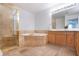 Bathroom features a large soaking tub and walk-in shower at 1735 Peachtree Ne St # 321, Atlanta, GA 30309