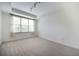 Spacious bedroom with neutral carpeting and large window at 1735 Peachtree Ne St # 321, Atlanta, GA 30309
