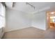 Bright bedroom with neutral walls and carpet, access to bathroom at 1735 Peachtree Ne St # 321, Atlanta, GA 30309